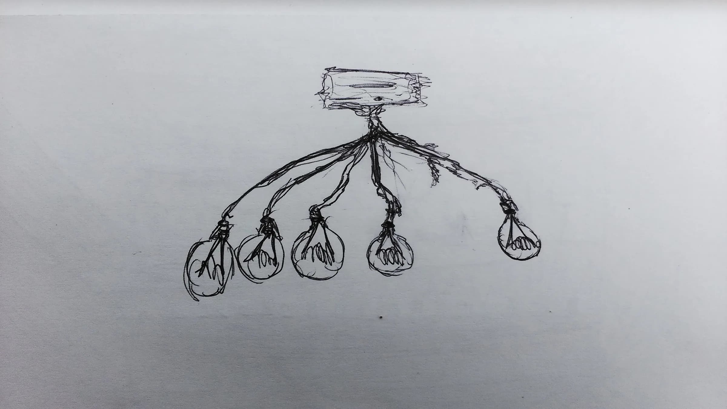 Ink sketch of a camera-like device with branches ending in light bulbs