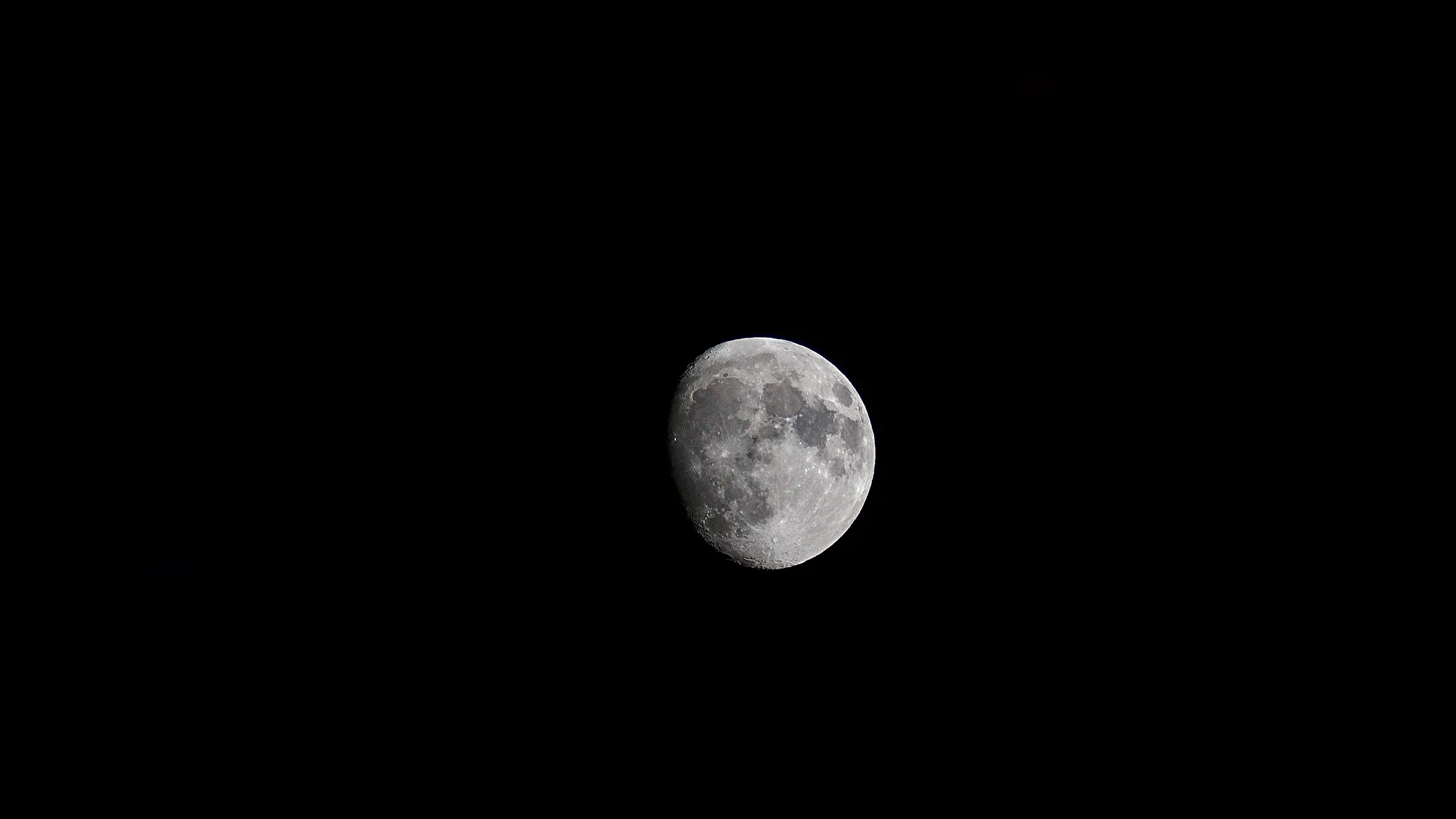 The moon photographed through a telephoto telescope
