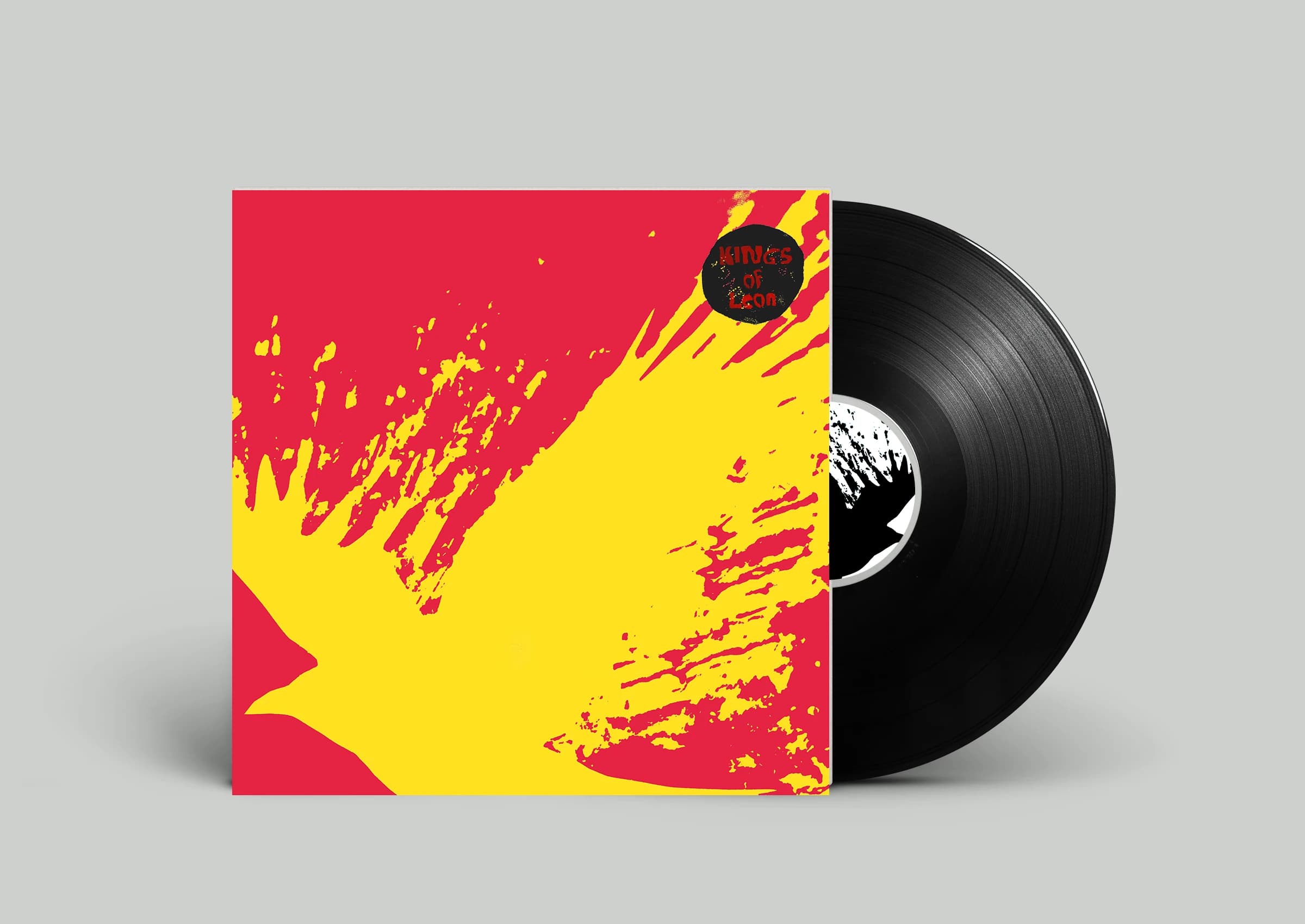 Record sleeve with a red and yellow bird graphic next to a black vinyl